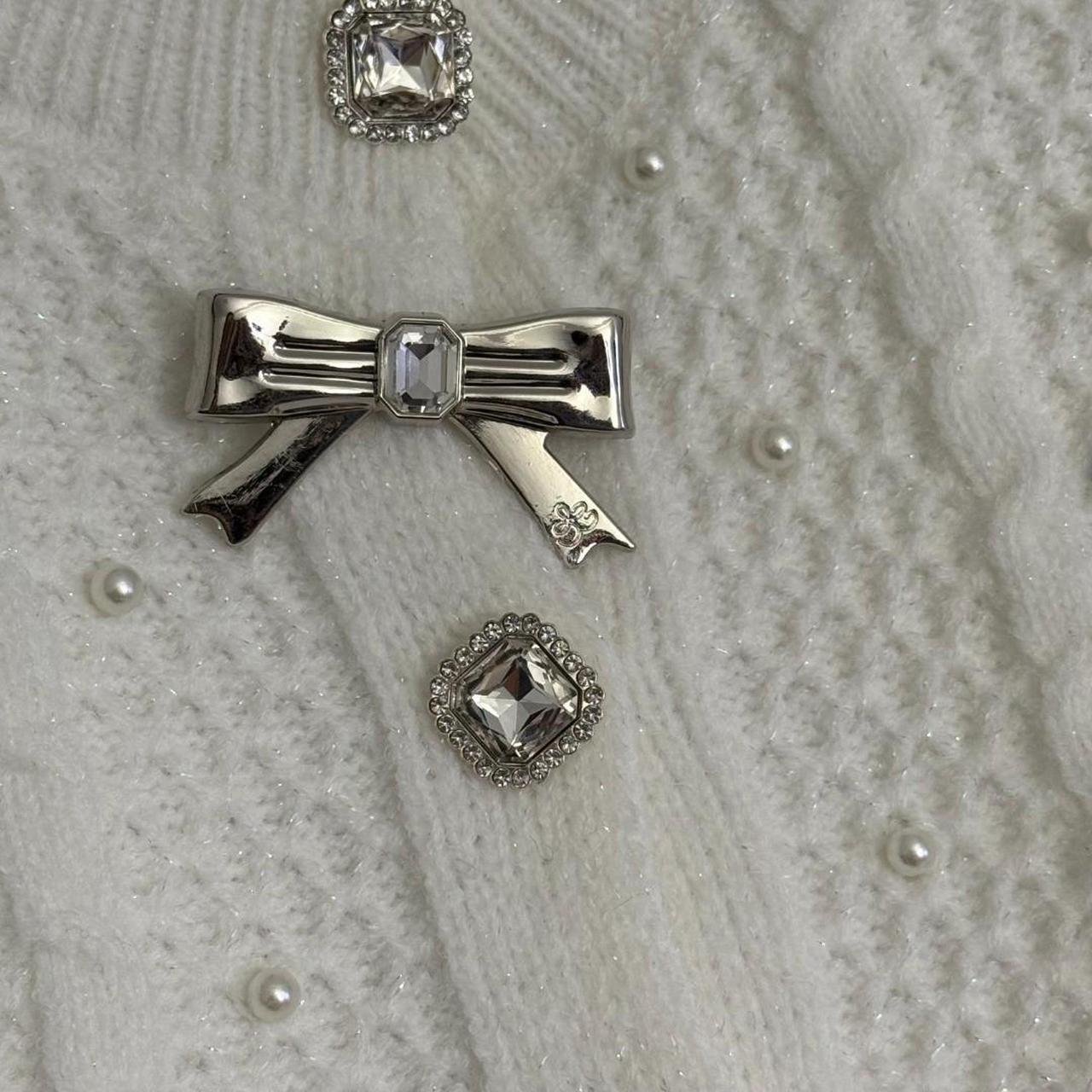 Chanel Women's white cream Cardigans